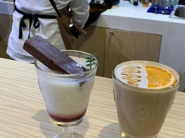 光明是什么品牌为啥要开咖啡店？咖啡市场行业发展趋势跨界的咖啡品牌有哪些